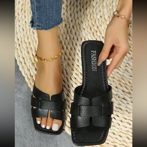 BRAND NEW black flip flops